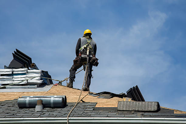 Professional Roofing technician working in Pompano Beach, FL